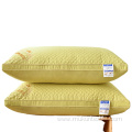 Yellow quilted pillow rest